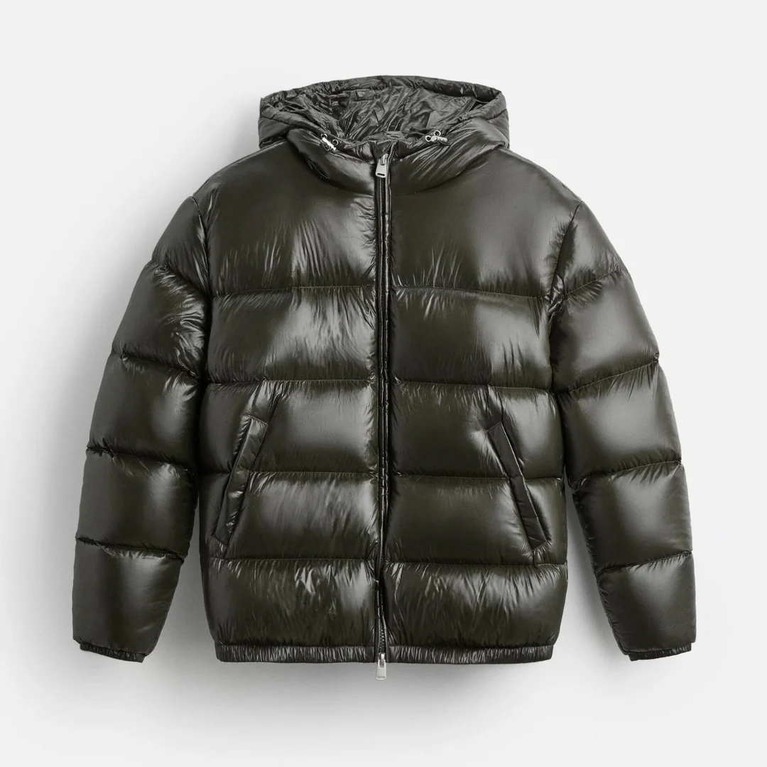 Close-up of a men's shiny quilted puffer jacket with hood, perfect casual winter jacket