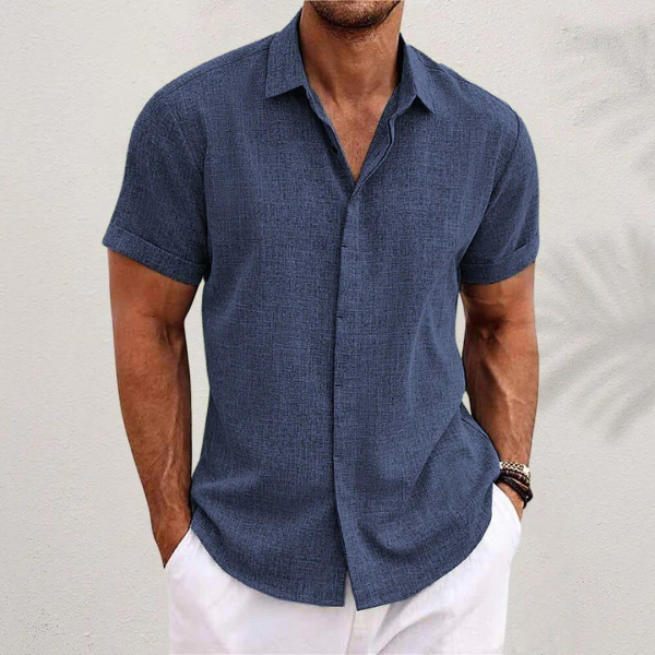 Men's short sleeve button-down shirt with spread collar & tapered fit, great for men's summer fashion.