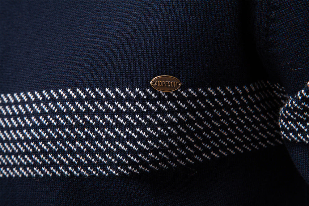 Collection of Siena men's half-zip knit sweaters in various colors on a hanger