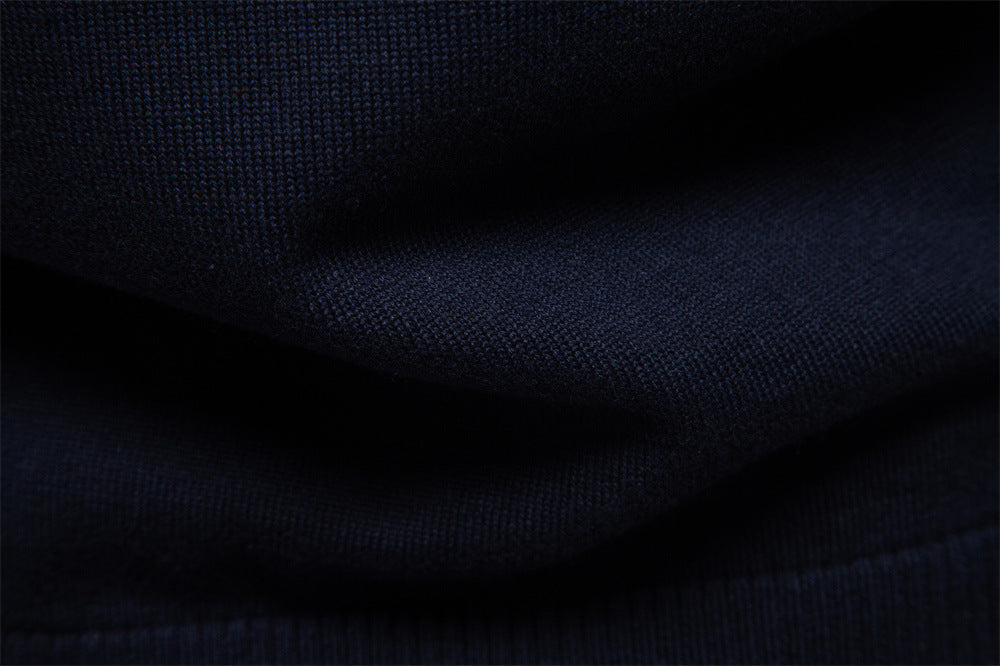lifestyle shot of man relaxing in a Siena half-zip cotton blend longsleeve sweater