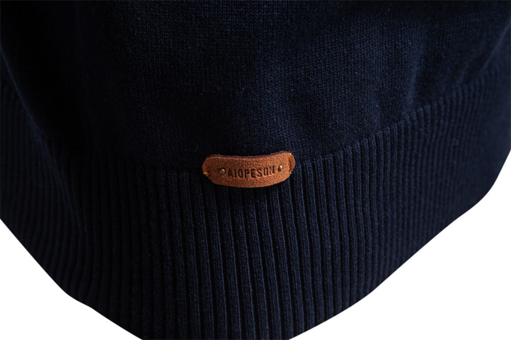 Close-up of the striped knit pattern on a men's Siena half-zip pullover sweater