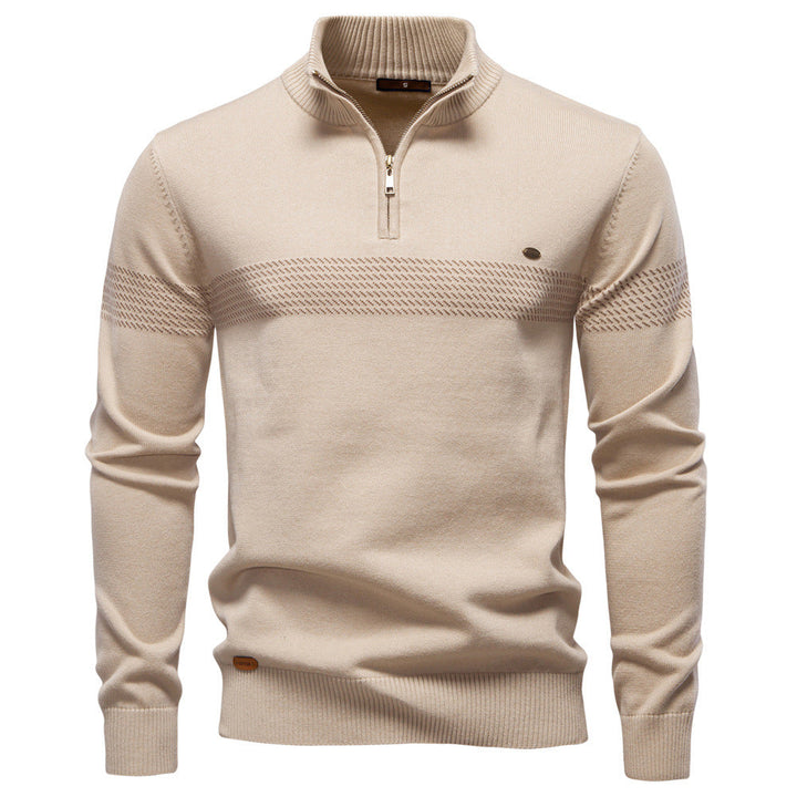Close-up of the half-zip detail on a men's Siena knit sweater, showing zipper and collar