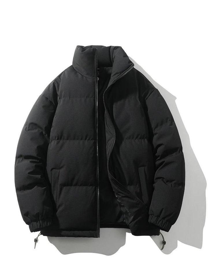 Men's sleek black puffer jacket with minimalist design.