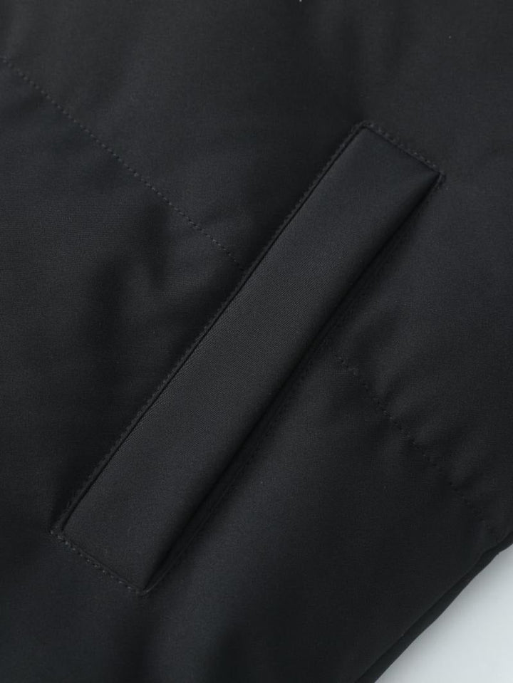 Sleek black men's puffer jacket, insulated for winter warmth.