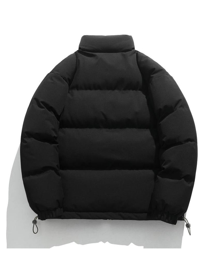 Black men's puffer jacket. Insulated for warmth. Stylish casual winter coat.