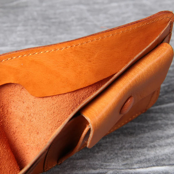Side profile of a slim bifold men's wallet, highlighting its thin design.