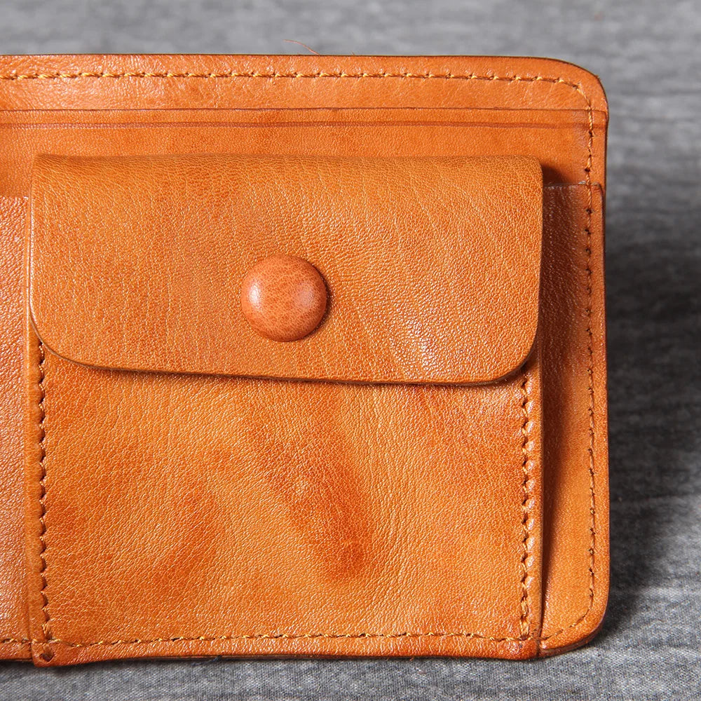 Backside of a men's leather bifold wallet, clean and unadorned.