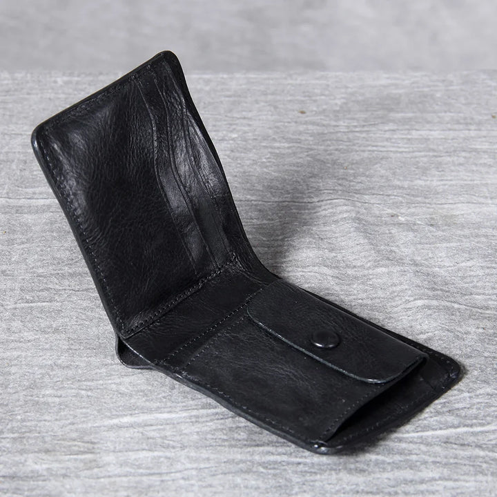 Stylish men's accessory: a dark brown slim bifold leather wallet on a neutral background.