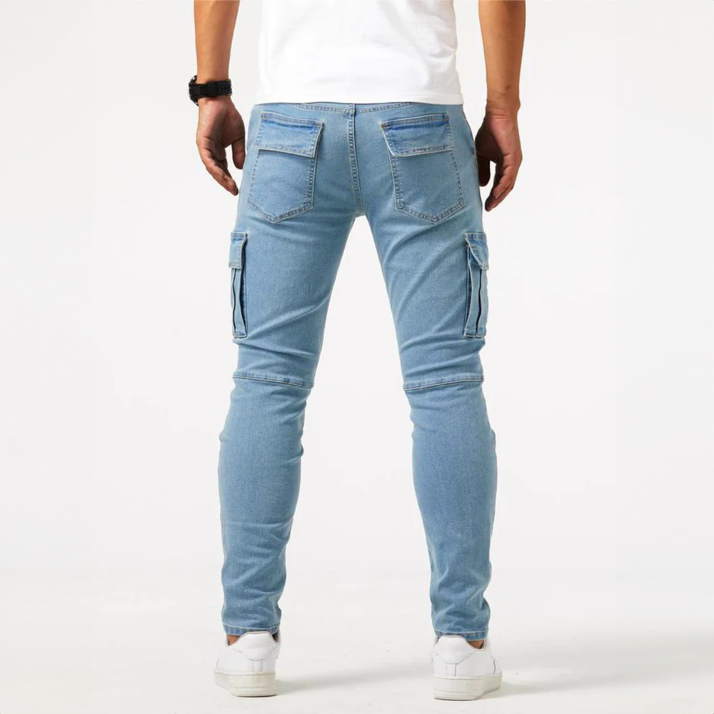 Everyday men's fashion: Slim fit cargo pants featuring prominent side flap pockets for a versatile look.