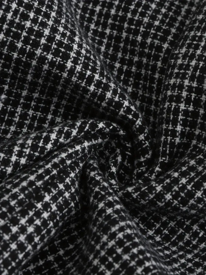 Man wearing a smart casual slim fit check blazer, showcasing modern men's fashion & versatile style.