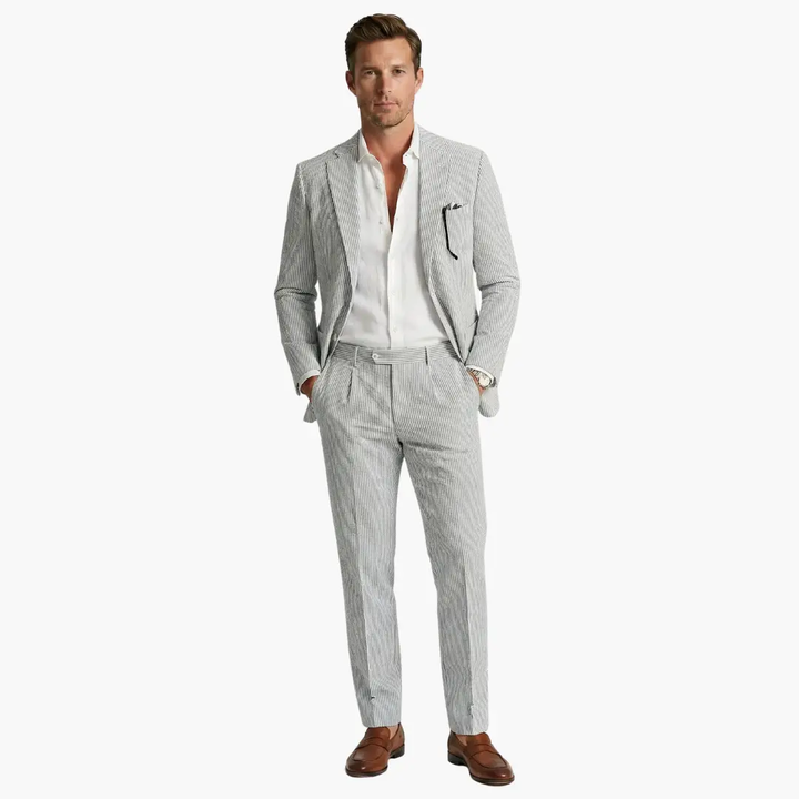 Detail of men's slim fit pinstripe summer suit fabric. Highlights modern two-piece design & texture for fashion.
