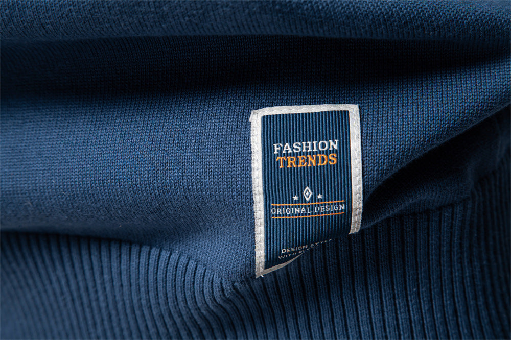 Classic men's apparel: a dark colored ribbed V-neck pullover for smart casual outfits