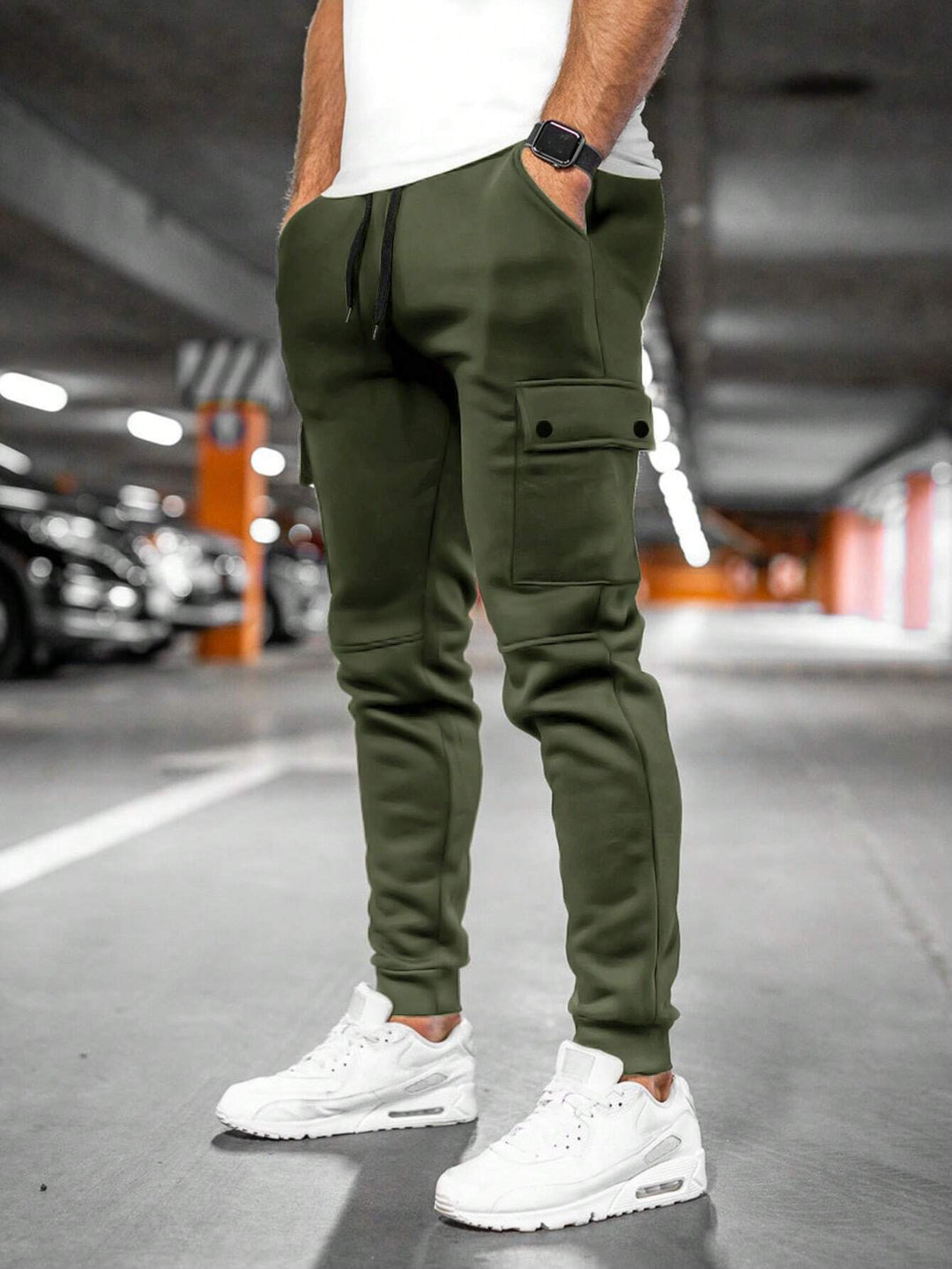 Men's tapered leg joggers, slim-fit streetwear pants offering casual style & flexibility.