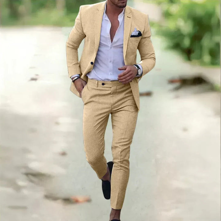 Tailored men's slim fit two-piece suit, perfect for groom or wedding guests, ensuring a sharp & modern formal style.