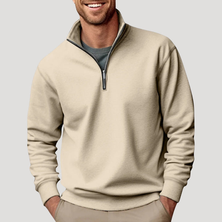 Stylish men's quarter-zip pullover sweater. Ribbed trim, long sleeve, perfect for smart casual & winter layering.