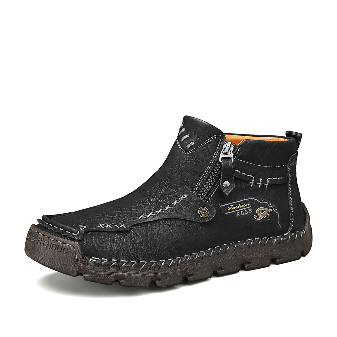 Men's outdoor zipper boots in black, showcasing modern tooling design and breathable comfort