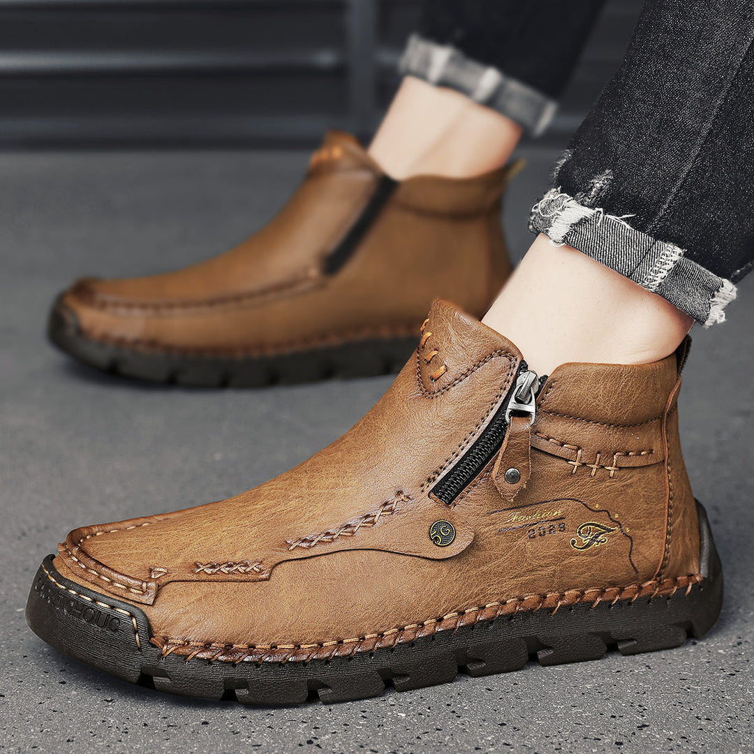 Close-up of the robust sole on Men's Soft Breathable Outdoor Tooling Zipper Boots, black