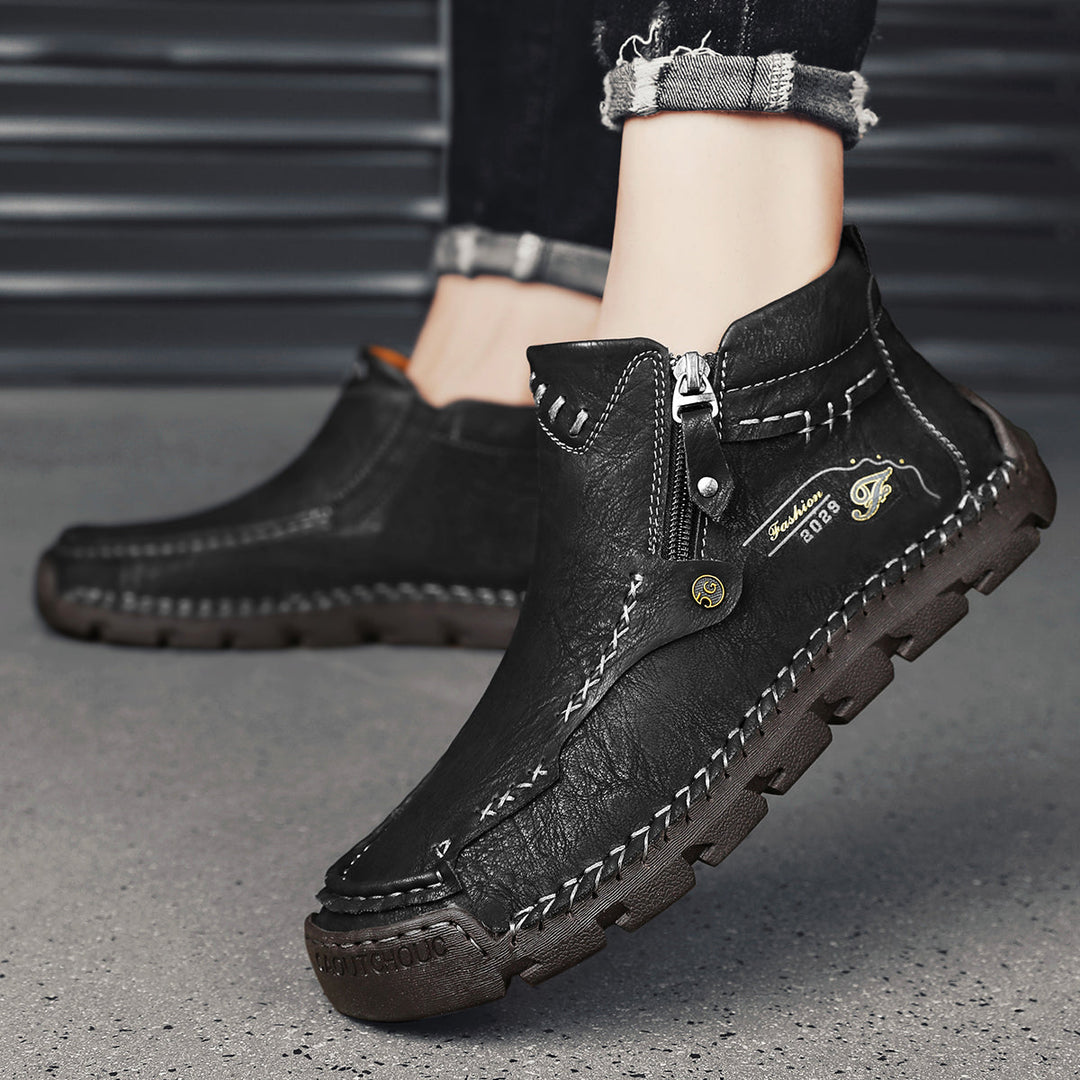 Men's fashion-forward black outdoor tooling boots with zipper, emphasizing breathability