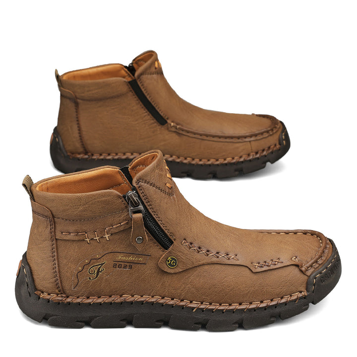 Side view of Men's Black Breathable Outdoor Tooling Zipper Boots, rugged sole detail