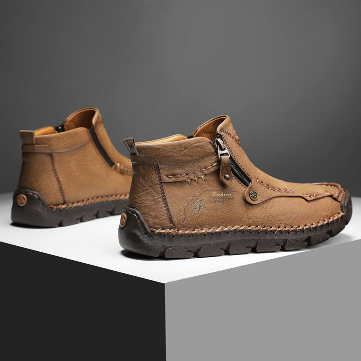 Comfortable men's black zipper boots for outdoor adventures, soft and breathable design