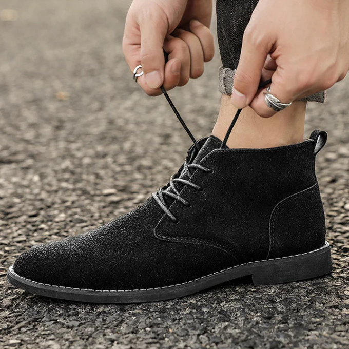 Full-length shot of men's chukka boots, showcasing their elegant and simple design.