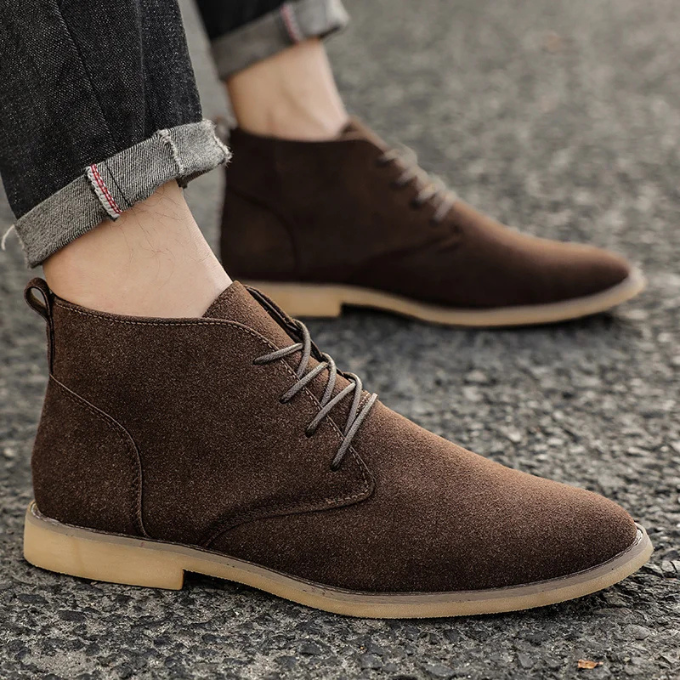 Front view of men's chukka boots, crafted from premium soft suede, offering comfort.
