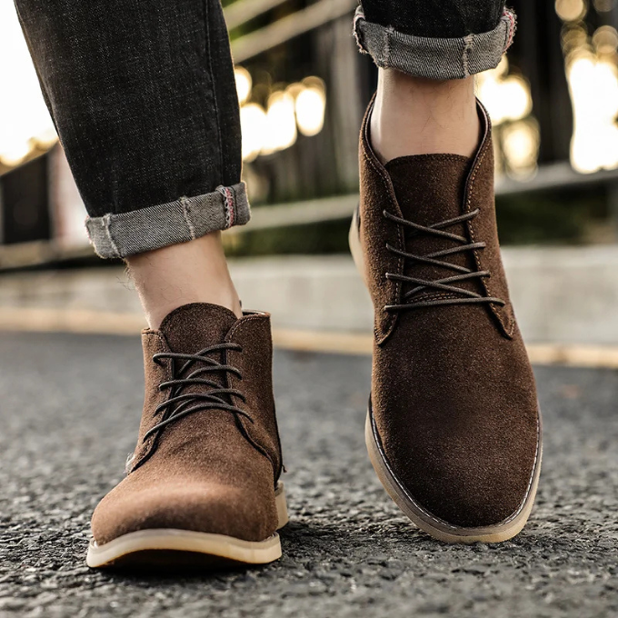 Side profile of men's casual suede ankle boots with a lightweight sole.