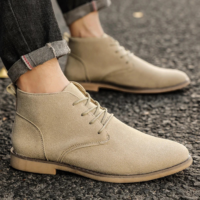Close-up of the soft suede texture on men's chukka boots, showing craftsmanship.