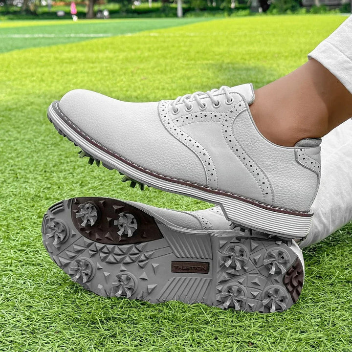 Detailed shot of brogue pattern on Men's Spiked Golf Shoes, quality craftsmanship