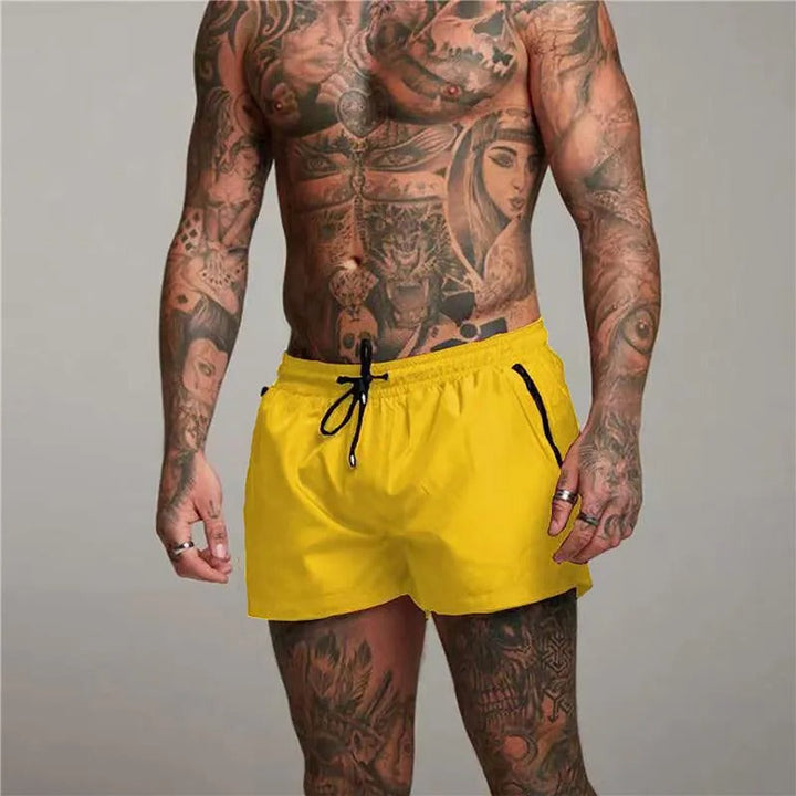 Active men's quick-dry swim trunks, perfect for beach vacations, pool days, or summer watersports.