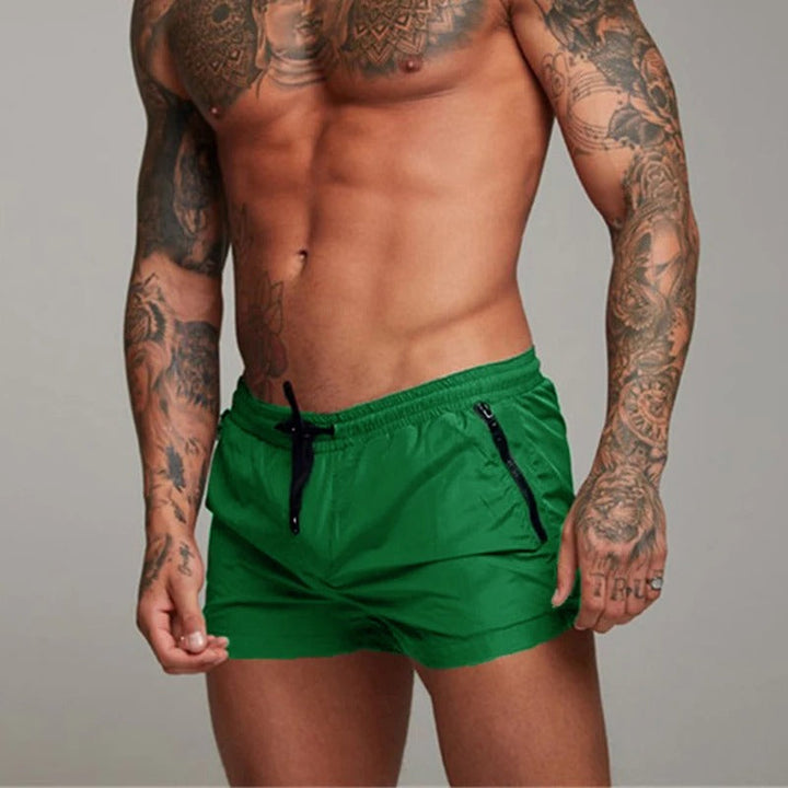 Comfortable men's stretch swim trunks featuring a quick-dry fabric and adjustable waist for ultimate flexibility.