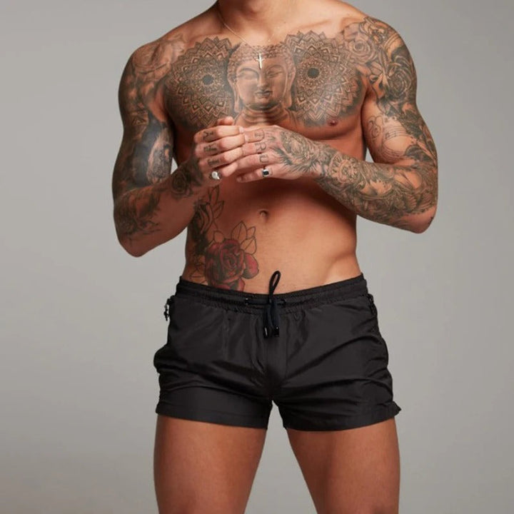 Performance men's quick-dry stretch swim trunks, ideal activewear for swimming, surfing, or poolside lounging.