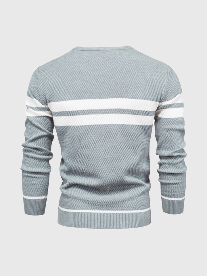 Model wearing a comfortable men's striped crewneck sweater, showcasing its casual style.