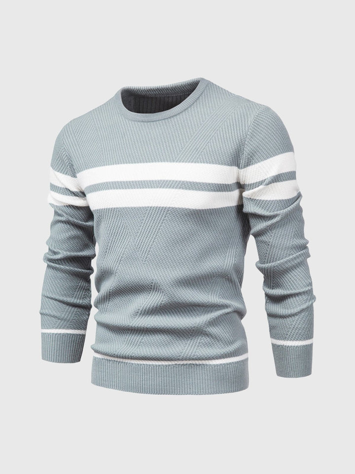 Men's fall fashion: a striped crewneck sweater in a versatile cotton blend material.