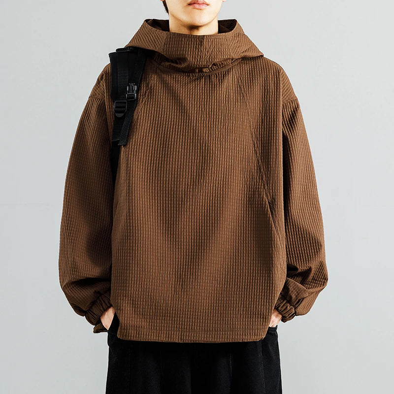 Beige men's structured fleece hoodie, a versatile and comfortable streetwear staple