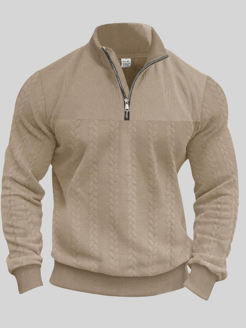 Folded men's half-zip pullover in a light blue, highlighting its soft cotton blend material and ready-to-wear style