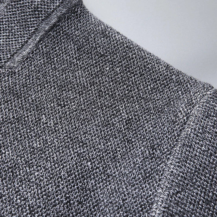 Back view of a black structured knit casual jacket for men, showing modern cut and fit