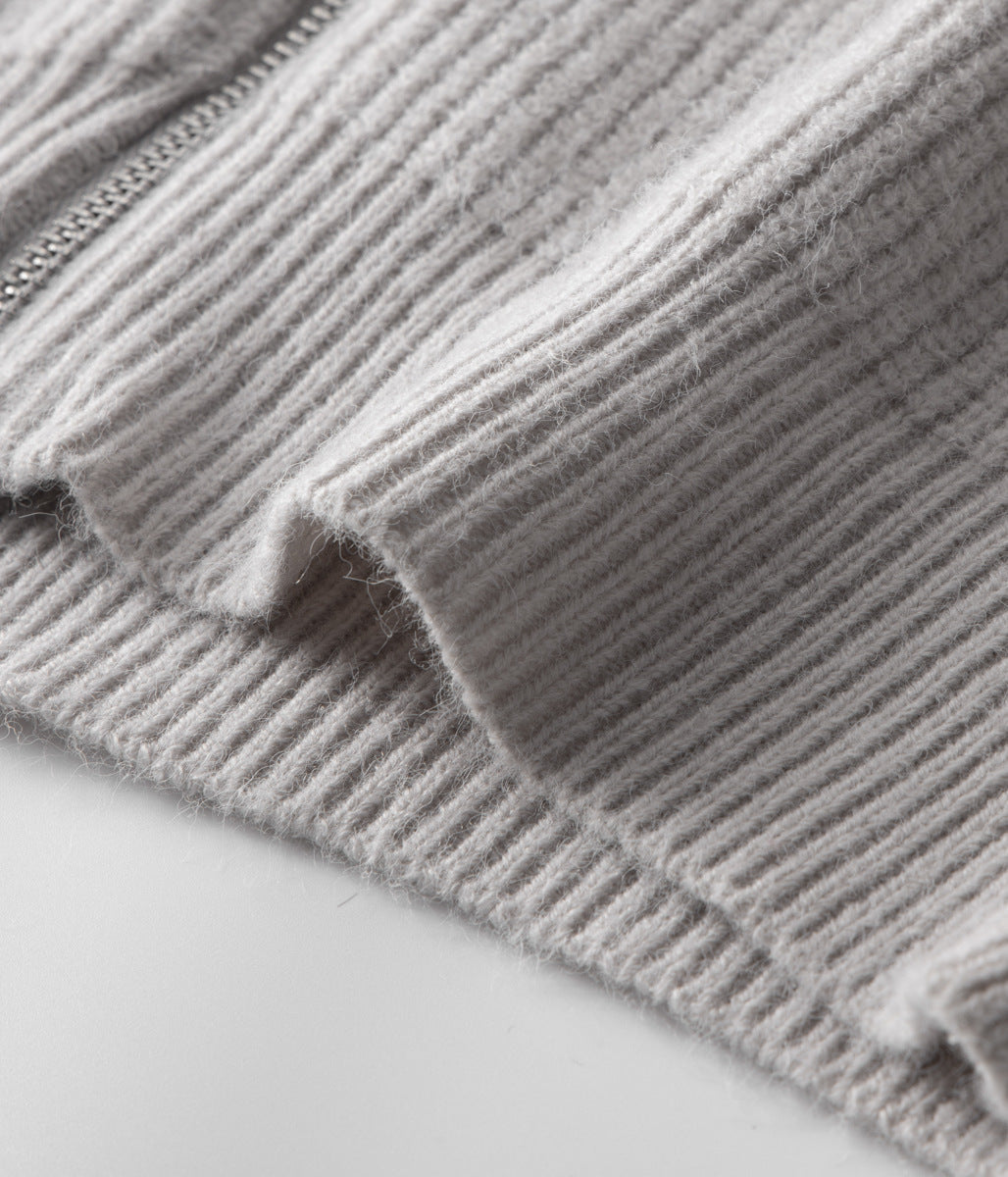 Man zipping up a stylish men's funnel neck sweater. Perfect versatile casual layering cardigan.