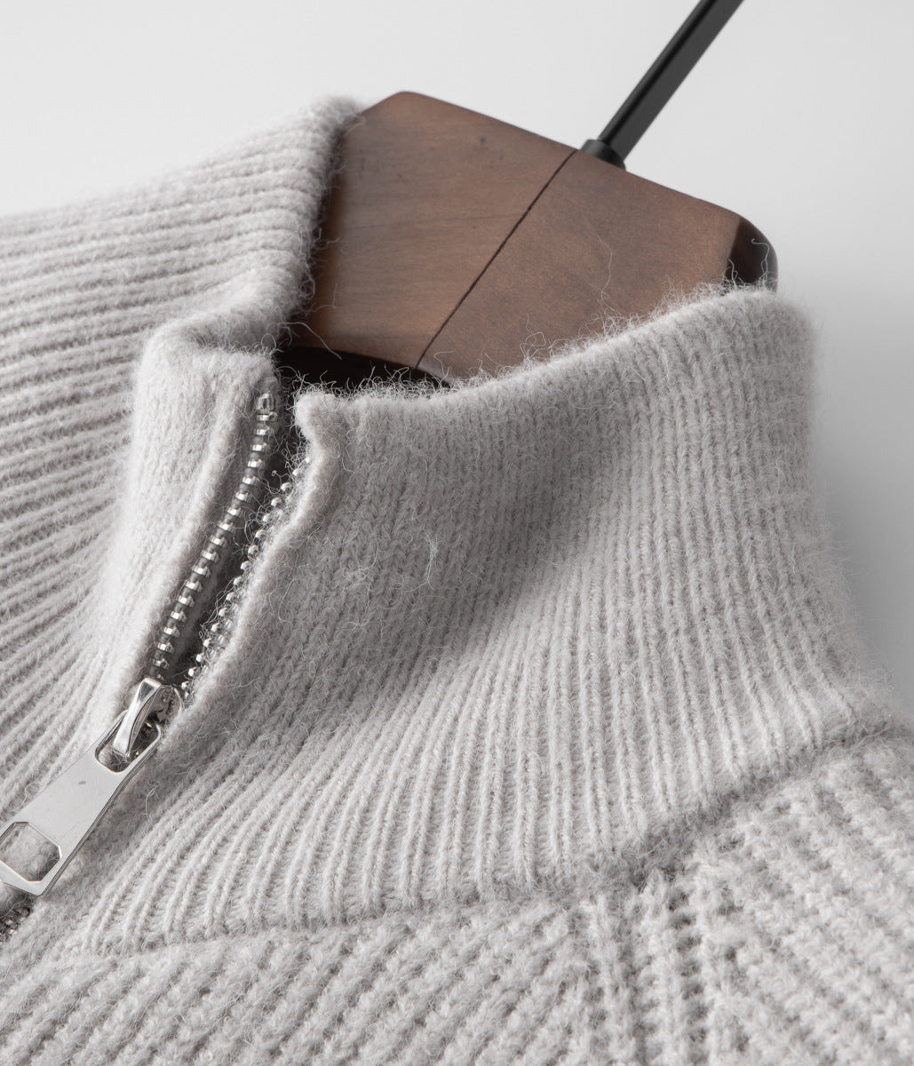 Detail shot of men's funnel neck zip-up sweater. Quality casual layering cardigan jacket.