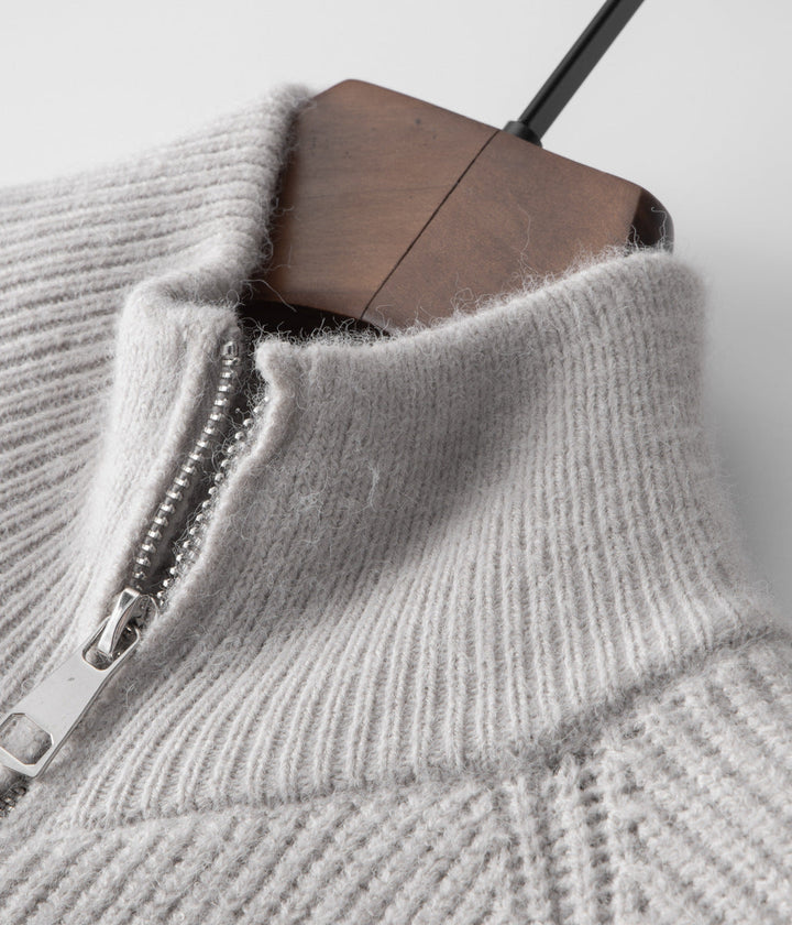 Detail shot of men's funnel neck zip-up sweater. Quality casual layering cardigan jacket.