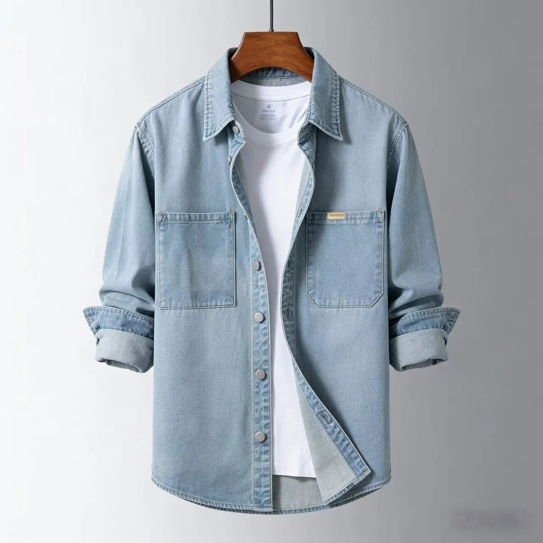 Casual men's blue button-down overshirt, perfect long sleeve layering piece.