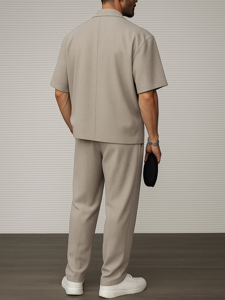Men's two-piece short sleeve blazer & tailored trousers set in a modern, smart casual style. Versatile men's fashion.