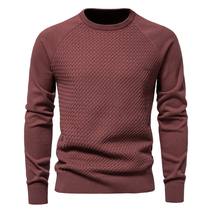 Side profile of a man wearing a casual waffle knit crewneck sweater, demonstrating comfortable fit