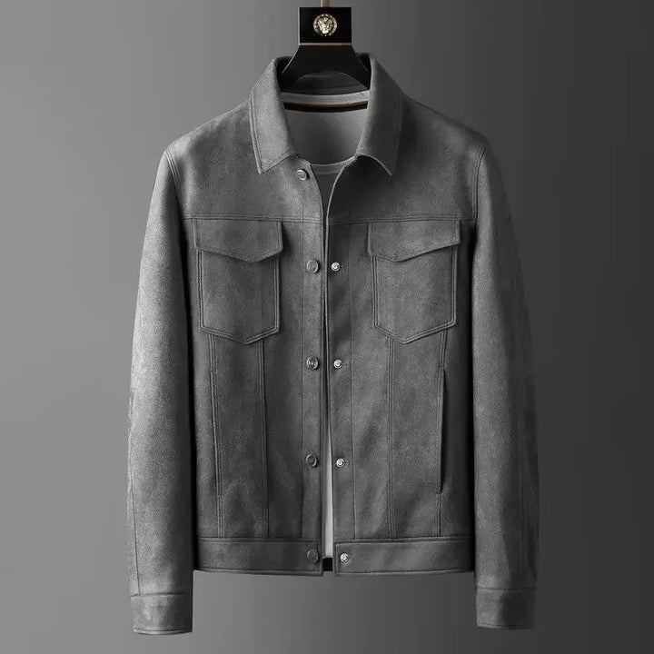 Close-up of a men's button-front suede jacket, highlighting the soft texture and detailed buttons.