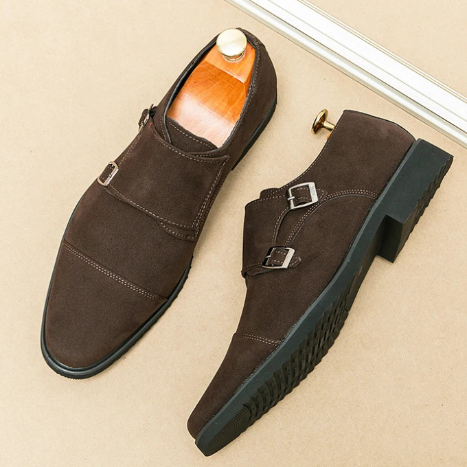 Men's suede double monk strap shoes in a rich burgundy color, highlighting craftsmanship.