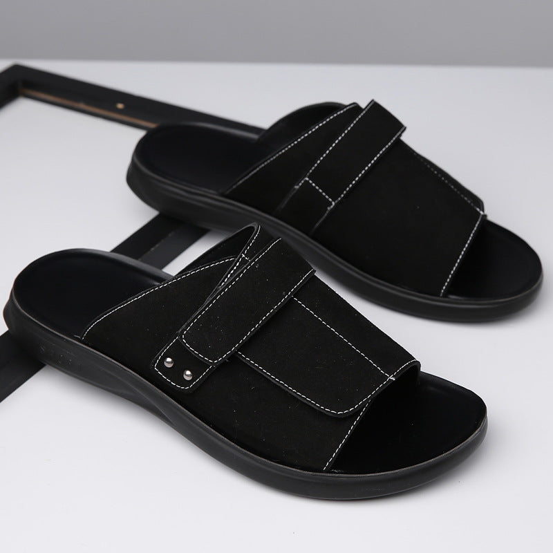 Pair of men's casual suede slide sandals, showcasing their versatile design.