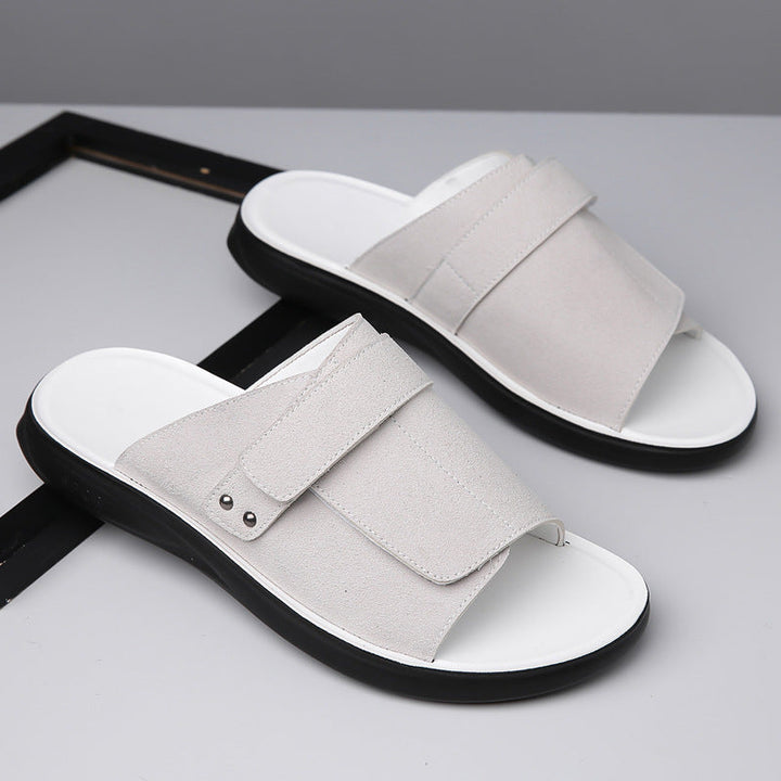 Men's fashion-forward suede slide sandals, great for warm weather and beach outings.