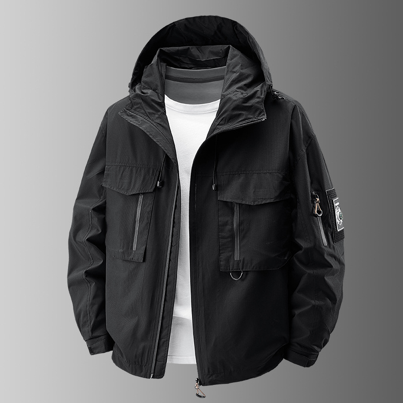 Lightweight men's utility patch jacket, black, durable for all-weather outdoor use.