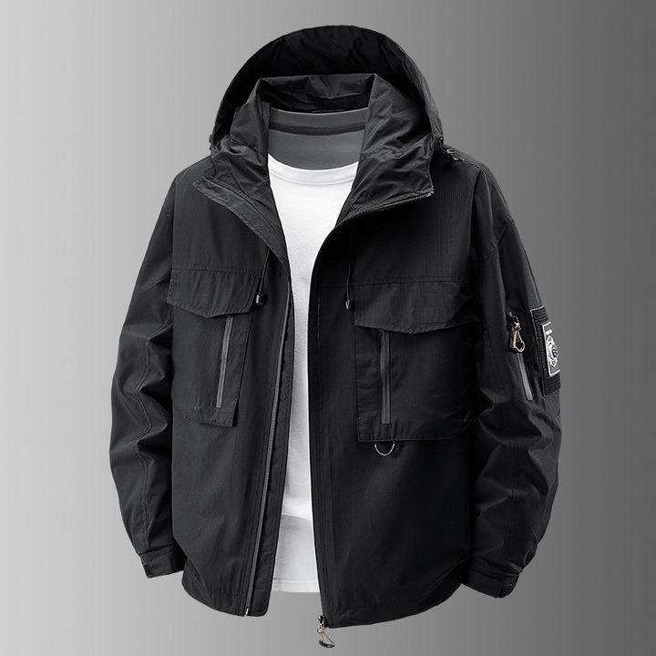 Lightweight men's utility patch jacket, black, durable for all-weather outdoor use.