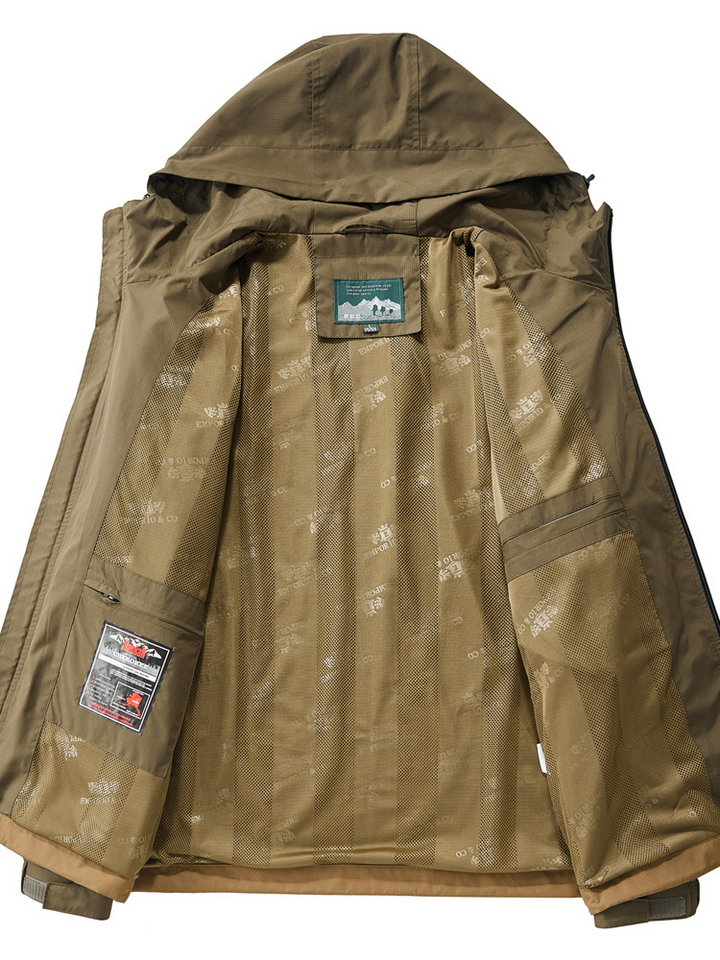 Men's versatile tactical jacket in desert tan, ideal all-weather outerwear for adventure and utility.